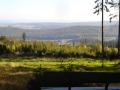 Ruhebank im Kellerwald mit Blick auf Densberg, den Hemberg und die dahinter liegenden Ortschaften